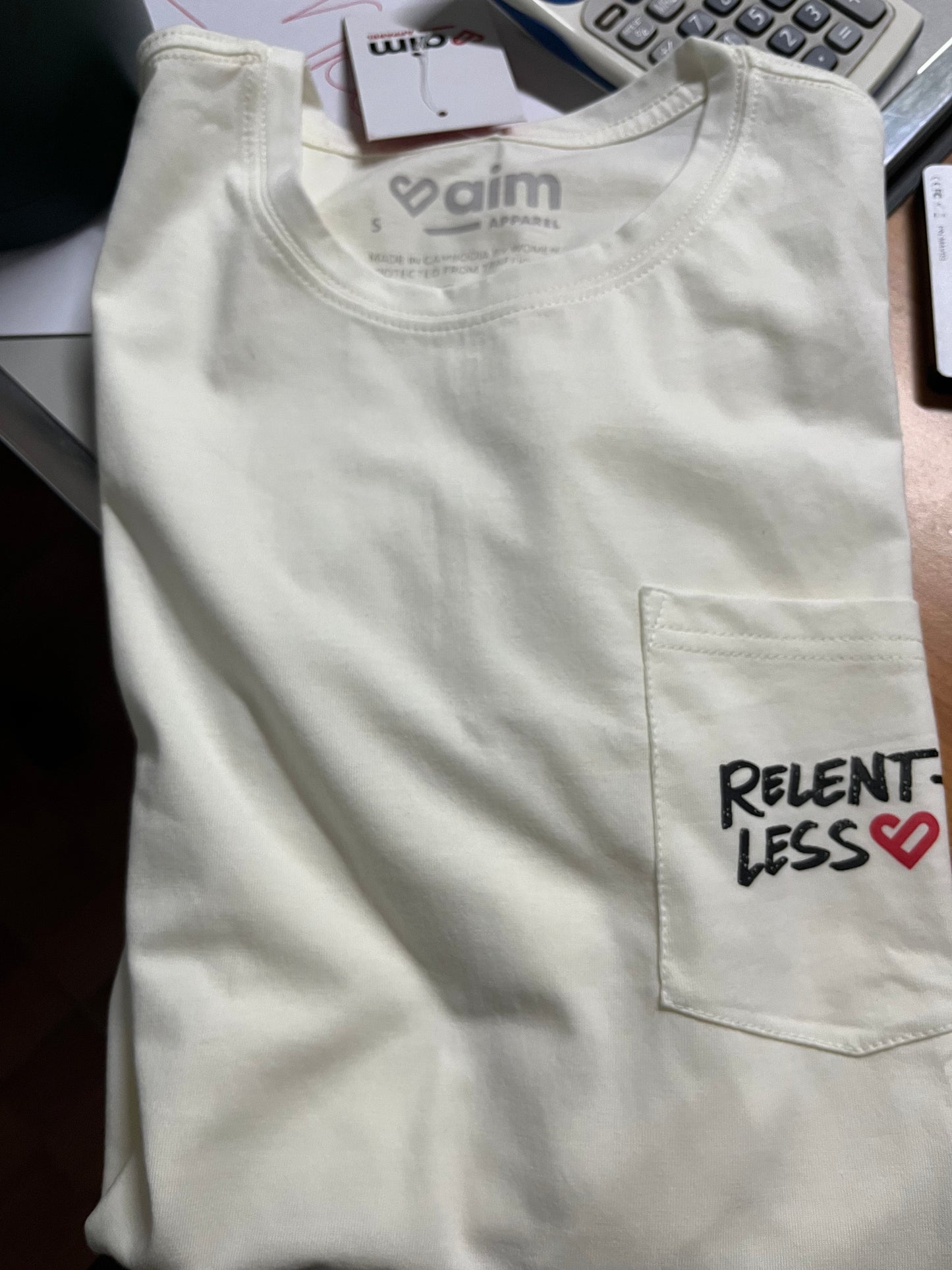 Relentless Pocket Tee: Cream - AIM CAMBODIA EXCLUSIVE